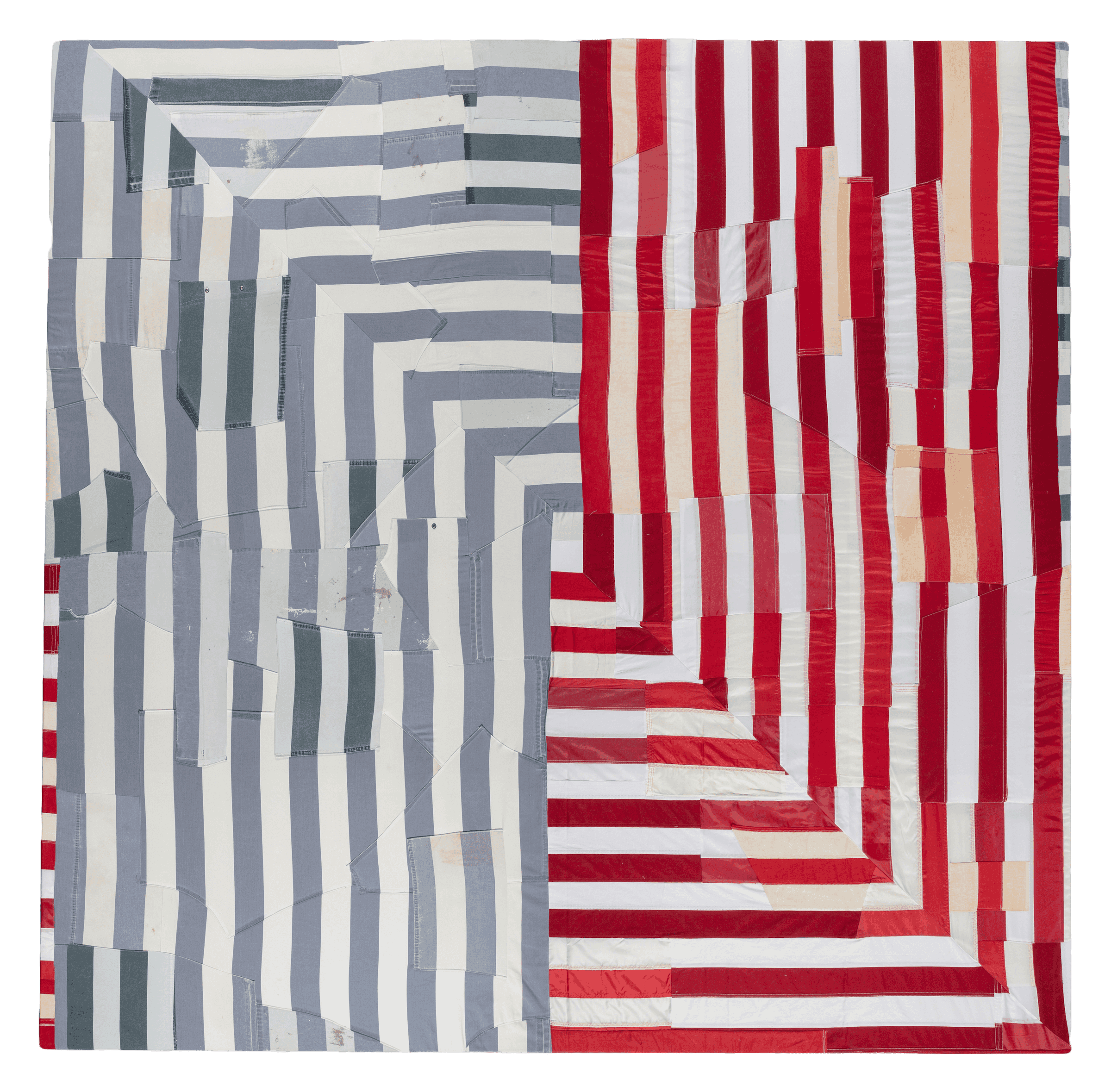 A quilted art piece that juxtaposes blue and white striped prison cloth with red and white the US flag. Pieces are layered in a square-shaped spiral pattern.