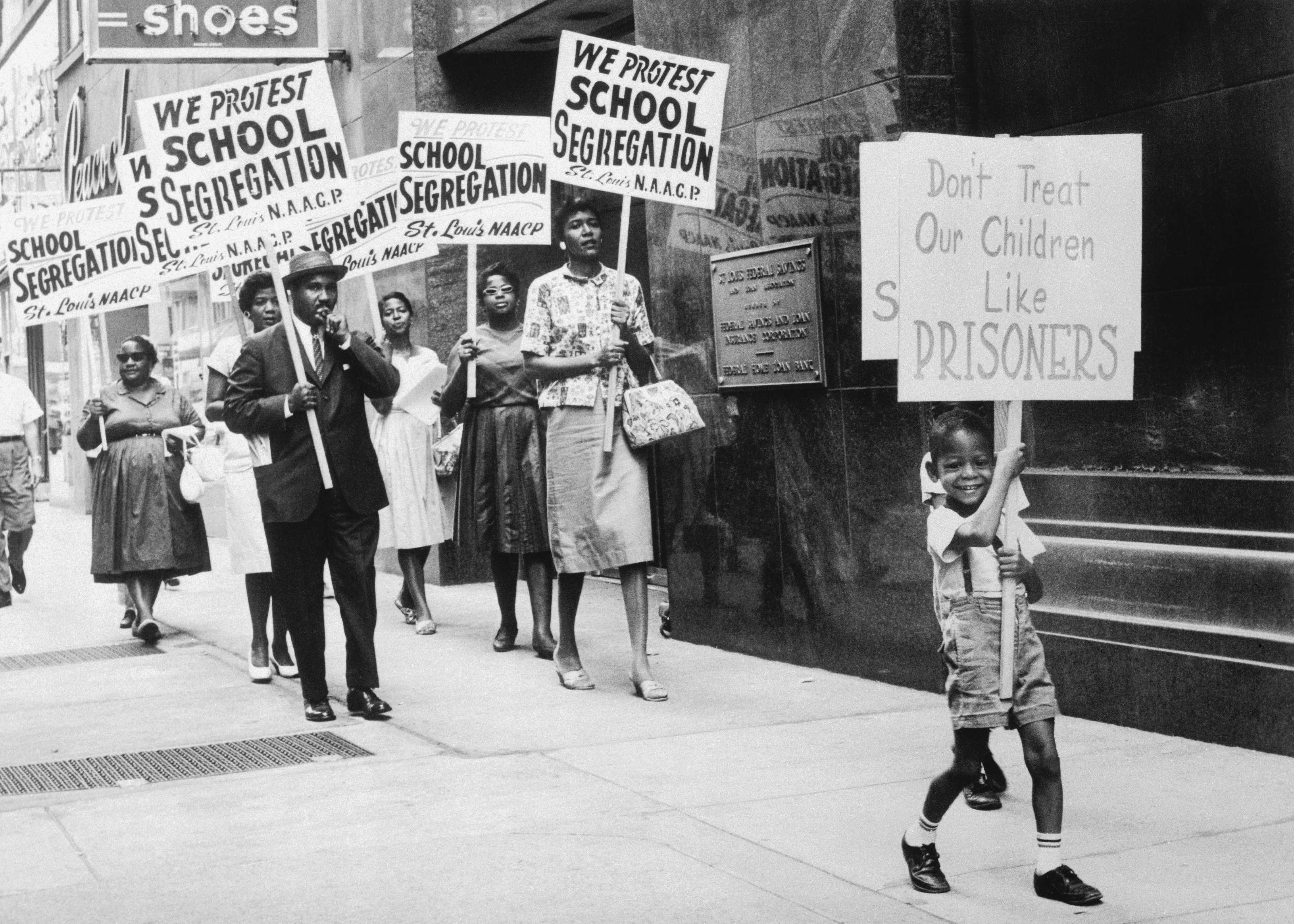 Black and white photograph of African Americans protesting school segregation sponsered by the St Louis NAACP.