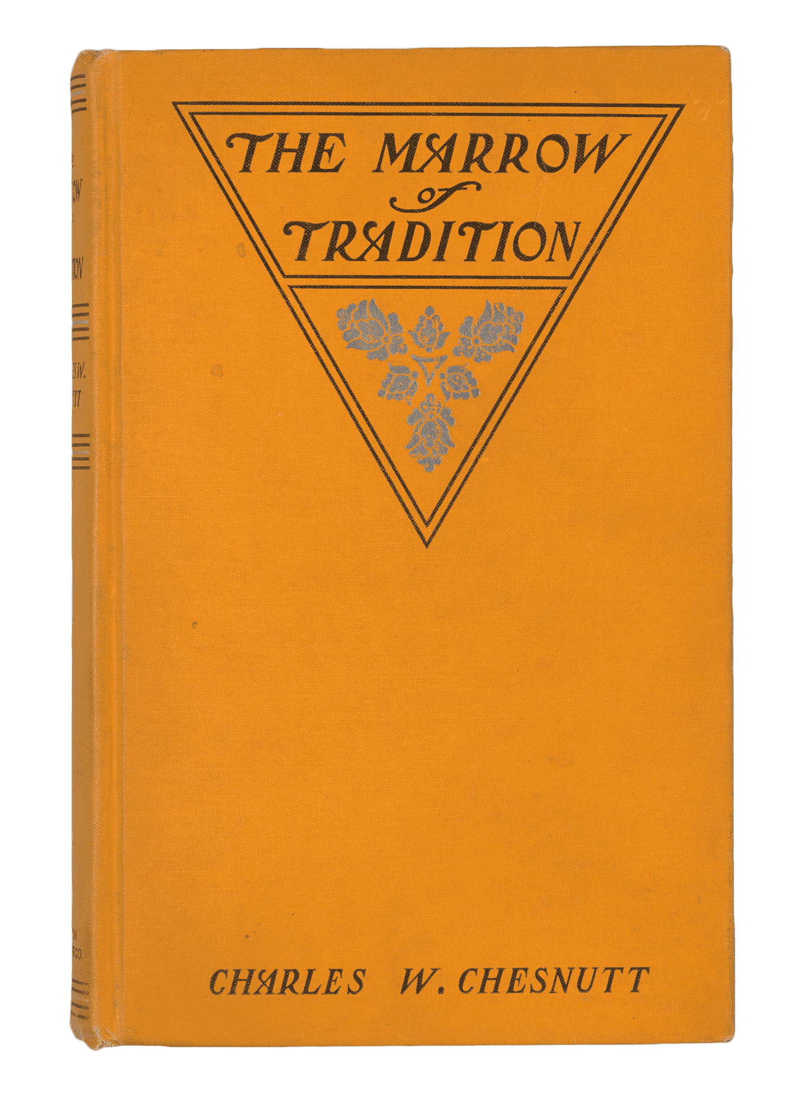 First edition of "The Marrow of Tradition" by Charles Chesnutt, with yellow cloth binding and black text.