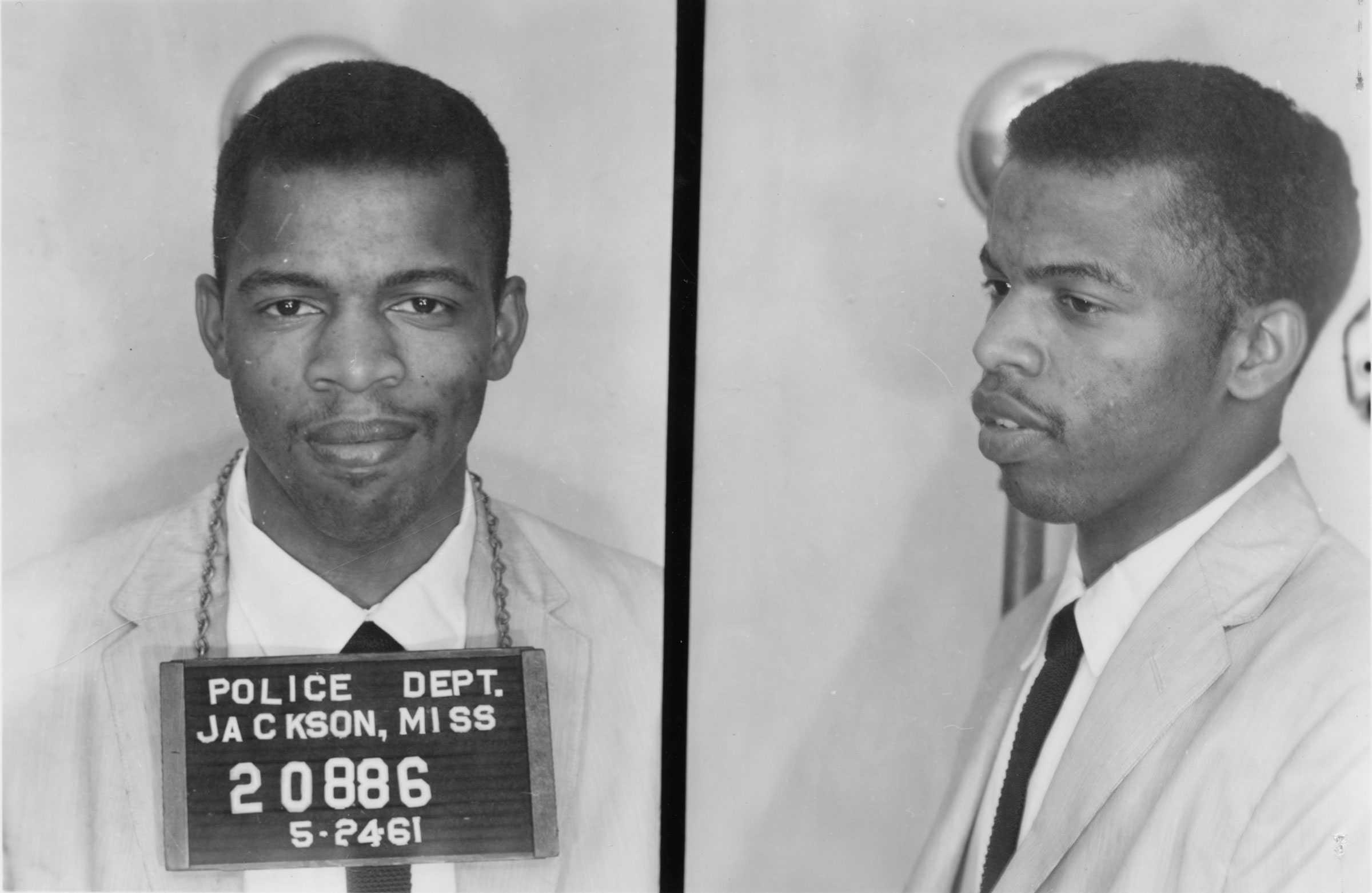 Two different angles of John Lewis’ mugshot with his inmate numbers around his neck. The one left, he is looking at the camera, and the other is of his side profile.