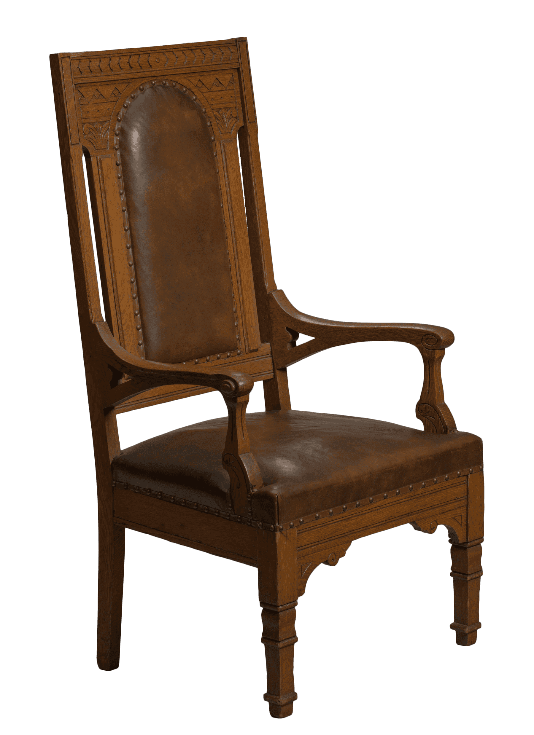 A brown ornately wood armchair with leather upholstery at seat and back. The chair has brass buttons at the upholstered edges.