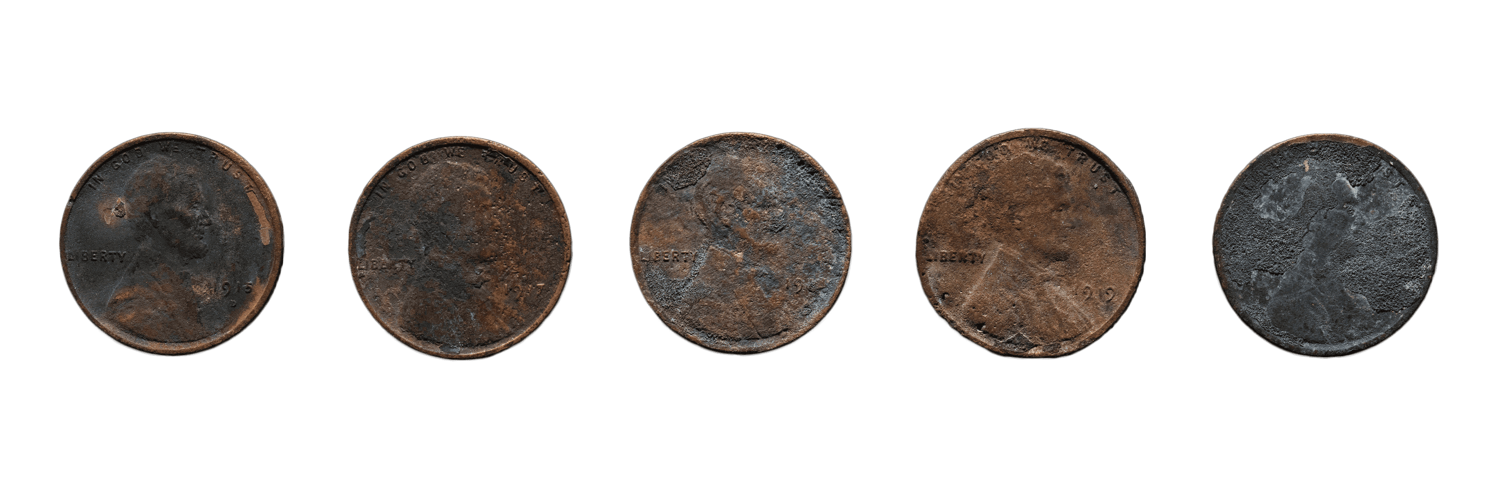 The front side of 5 charred pennies from the 1921 Tulsa Race Massacre.