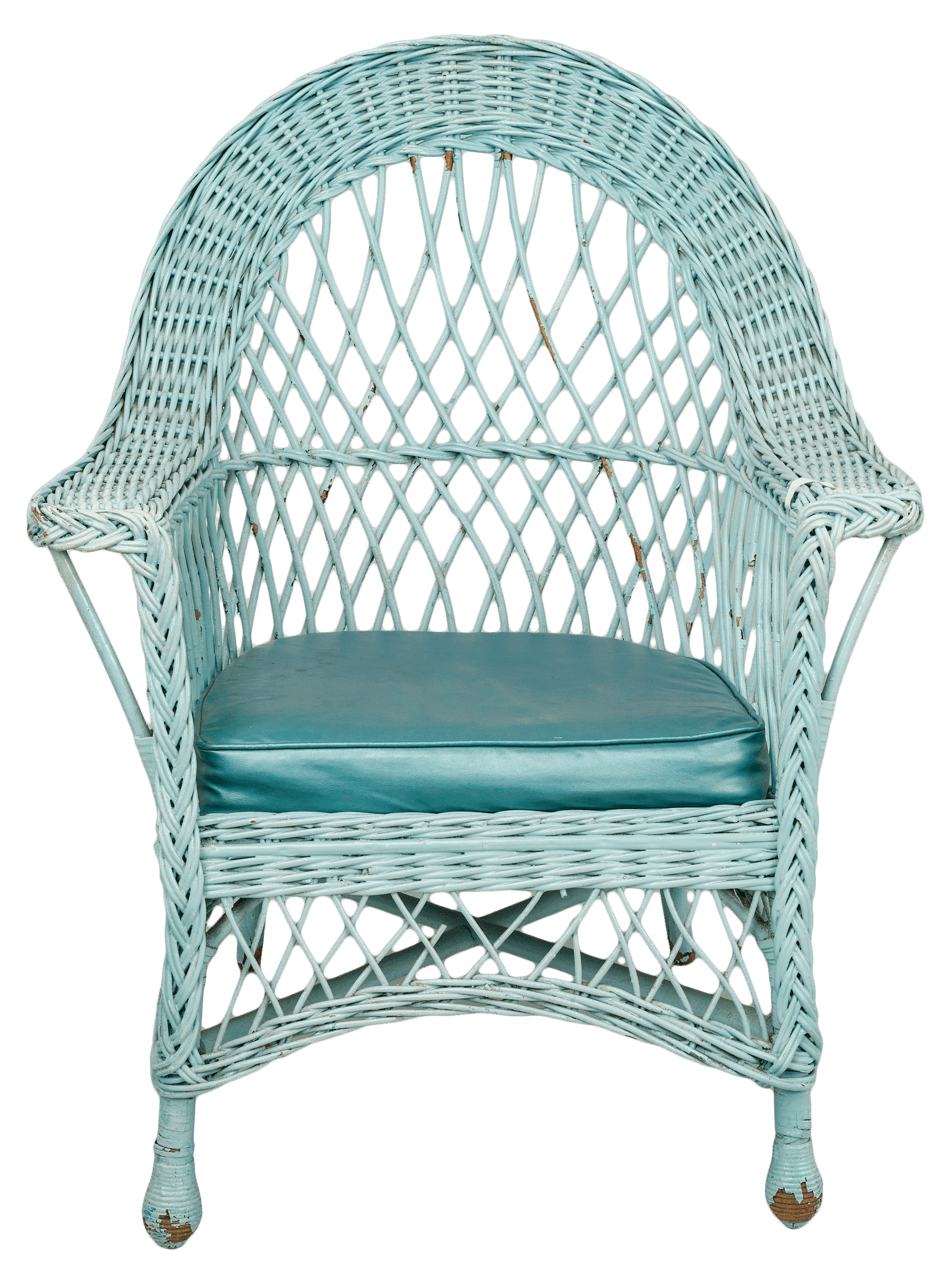 A wicker armchair from the Rock Rest Tourist Home. The chair features a wicker wrapped wooden frame and a seat cushion. The wicker and wood have been painted a light blue and the cushion is a darker cadet blue.