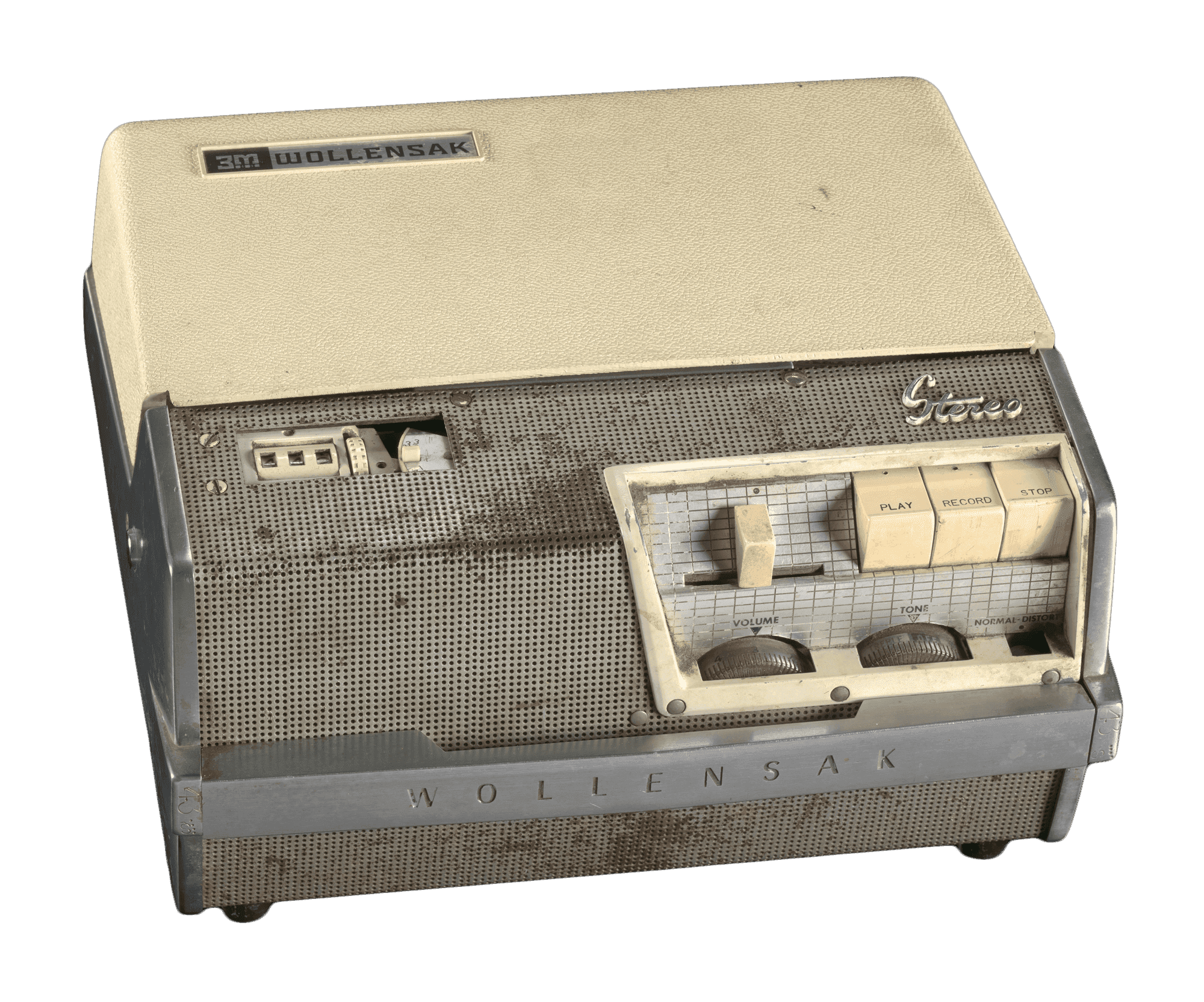 Tape recorder used by Malcolm X. It is a beige Wollensak T-1515 with buttons, dials, and tape reel compartment.