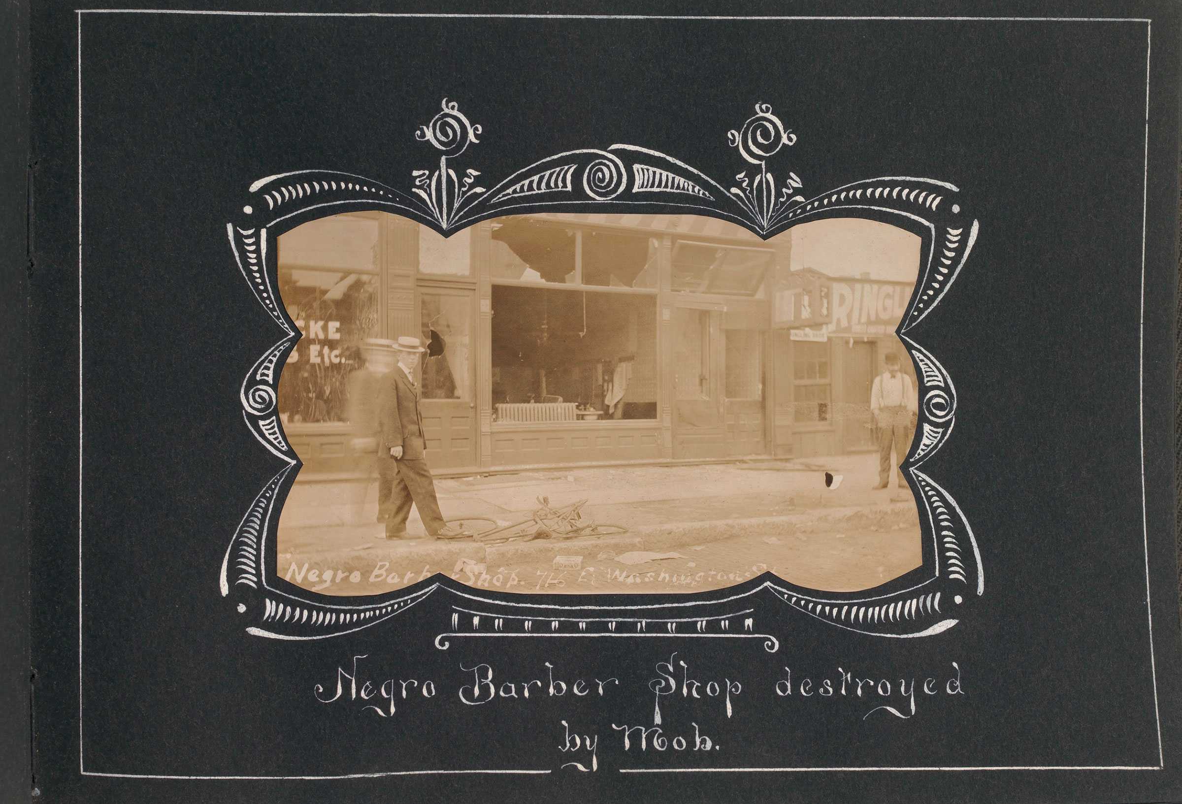 A sepia-toned photo of a destroyed building of Springfield Illinois race riot aftermath with hand-drawn captions.