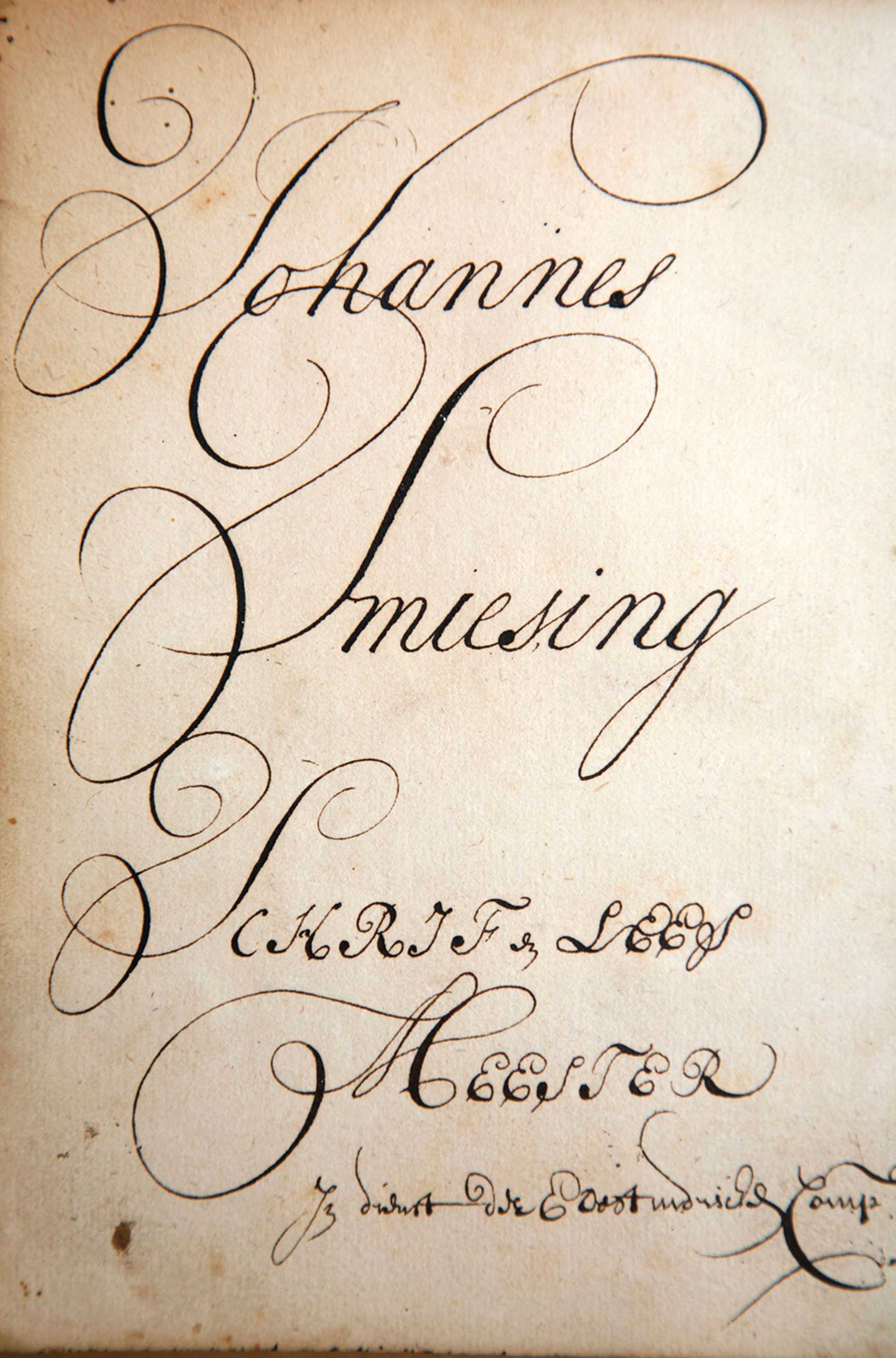 The cover journal with large, light cursive font. The paper is slightly yellowed.