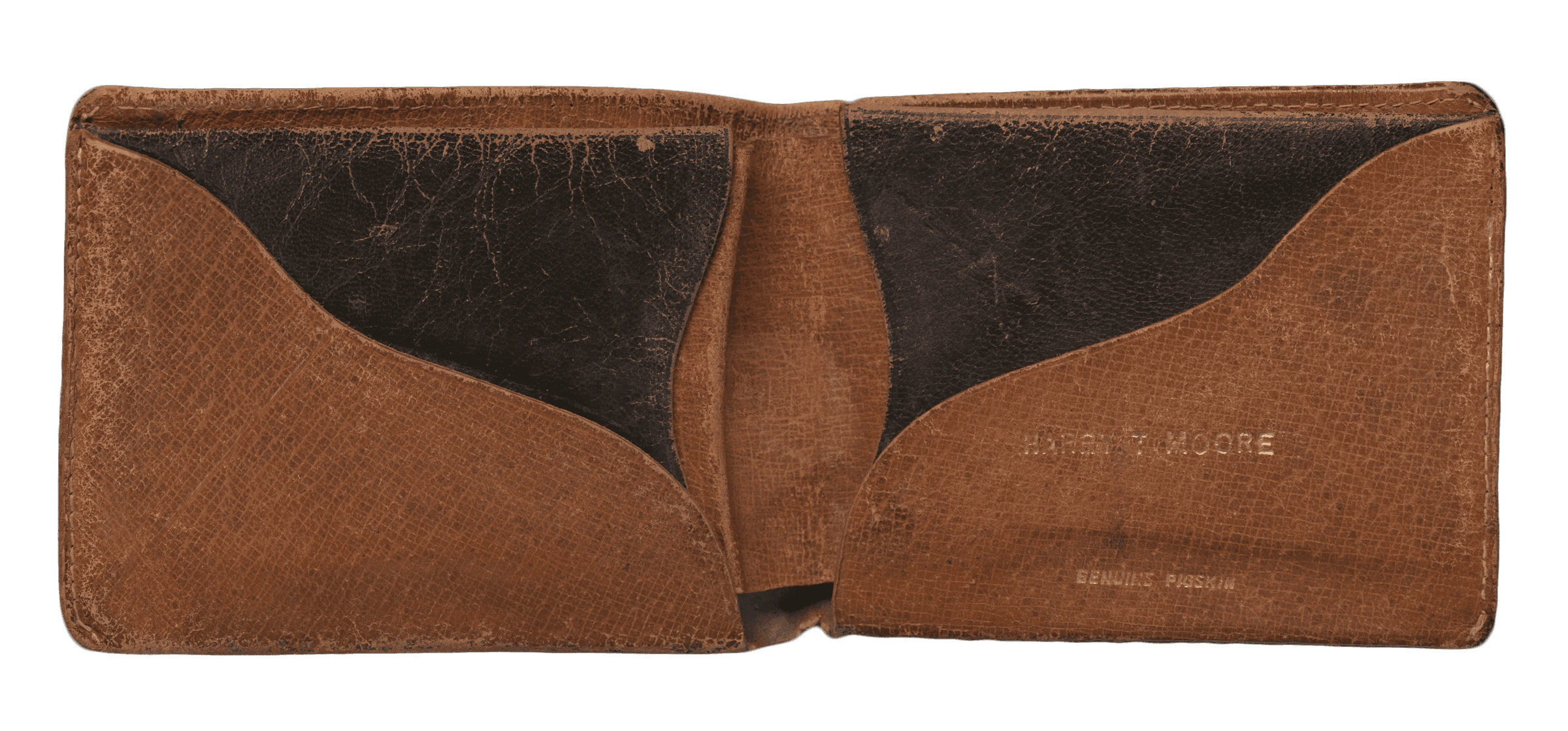 Brown pigskin leather wallet embossed with “HARRY T MOORE” in gold. It features interior pockets, a bill fold, and shows heavy wear with scarring.