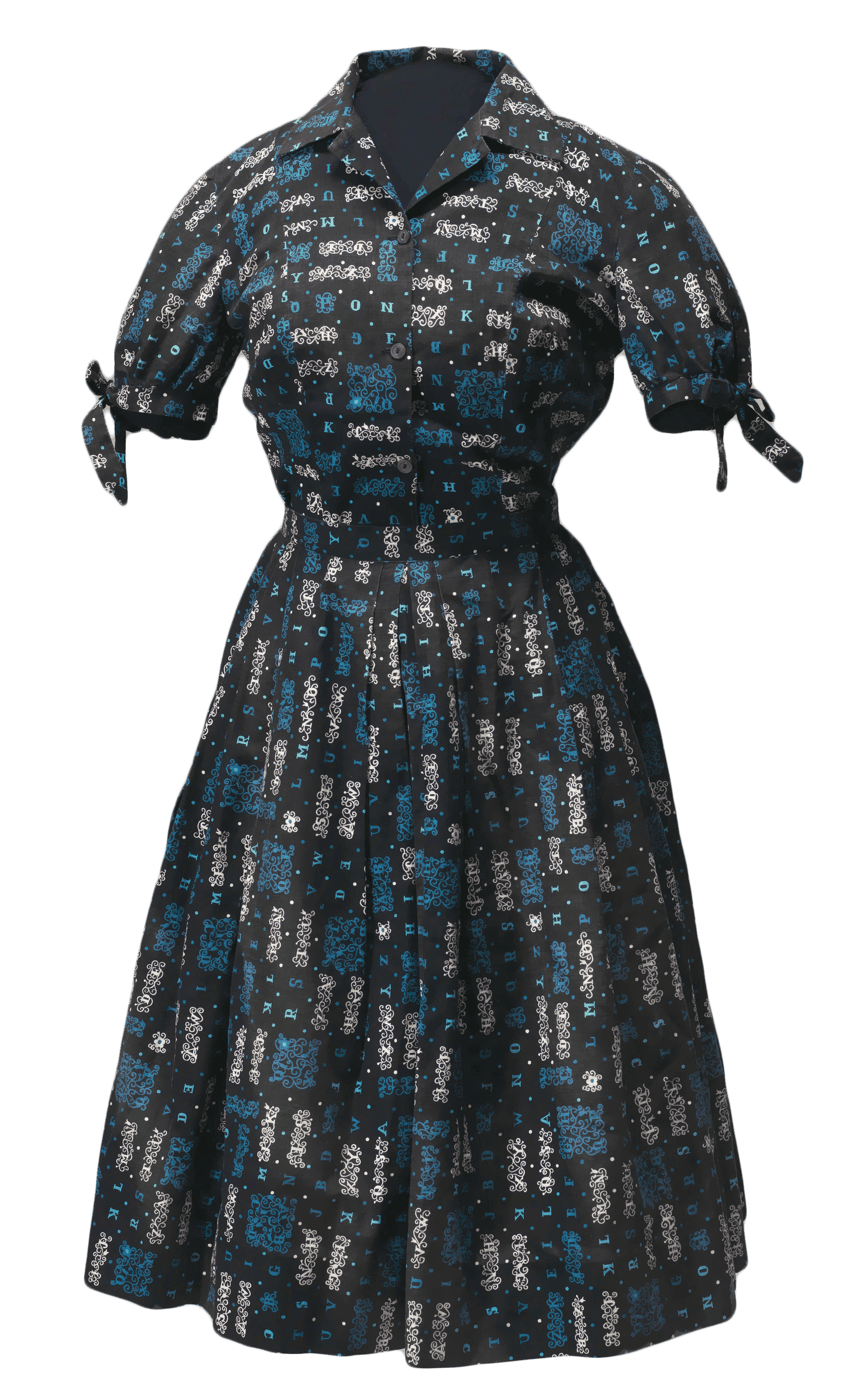 Outfit worn by Carlotta Walls LaNier during the 1957 Little Rock Crisis: a skirt and blouse with an alphabetical print in blue, teal, and white on black.