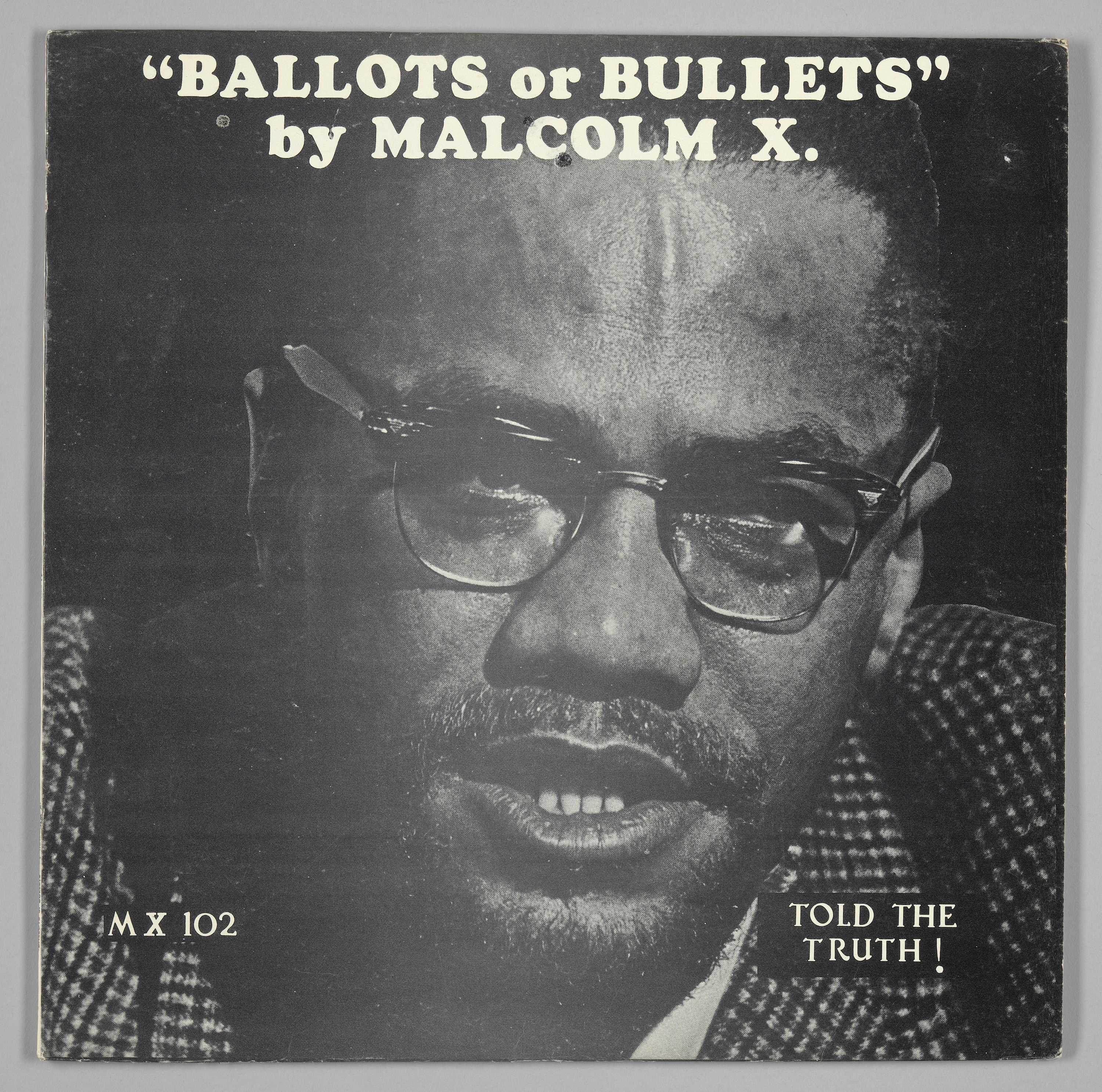 Album cover that has a black and white image of Malcom X. Text in white at the top reads: "Ballots or Bullets" / by Malcom X.