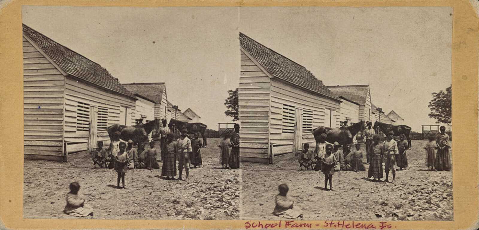 Photograph of enslaved persons with children