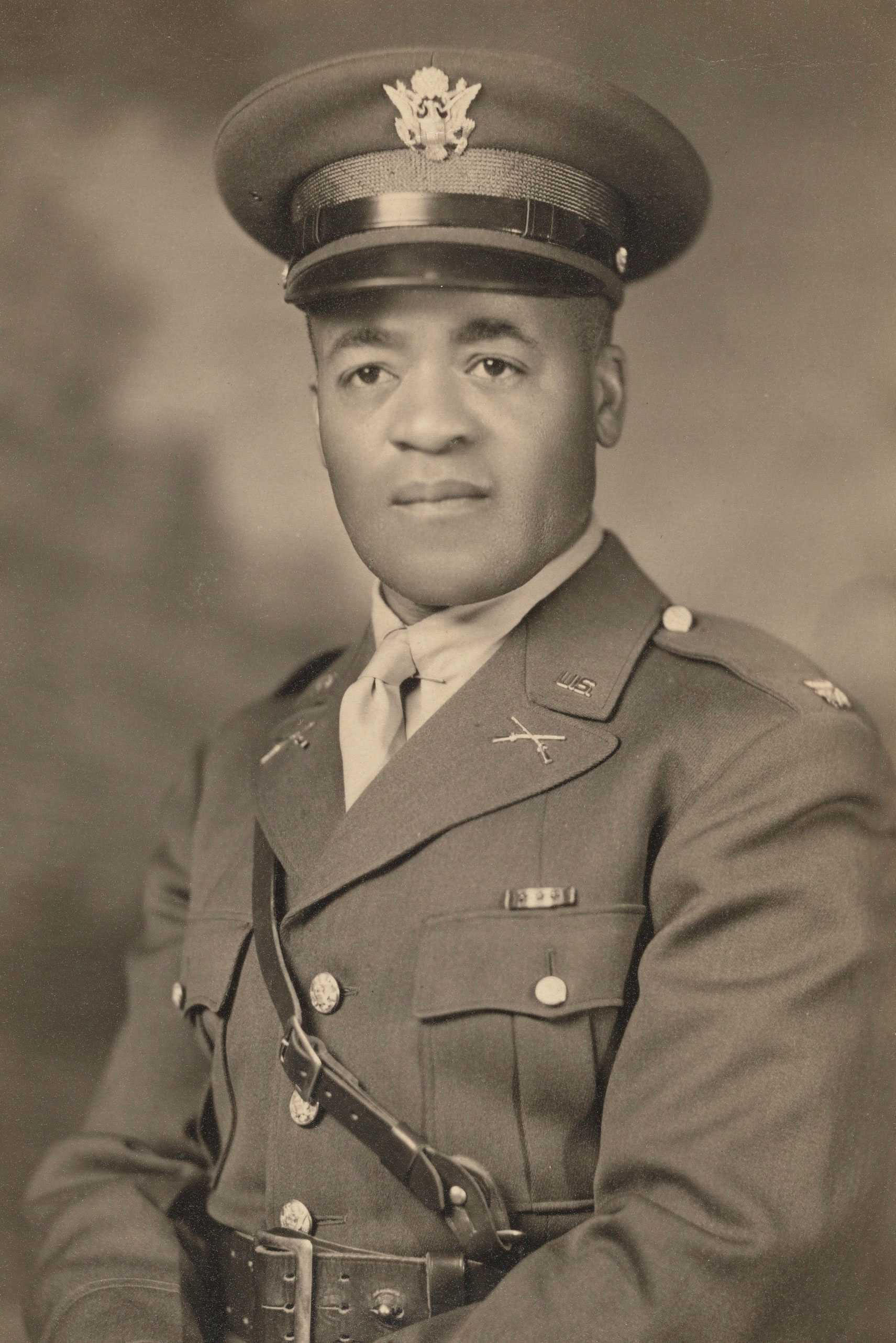 Photographic portrait of Major Charles J. Blackwood in full military dress, seated with folded hands.